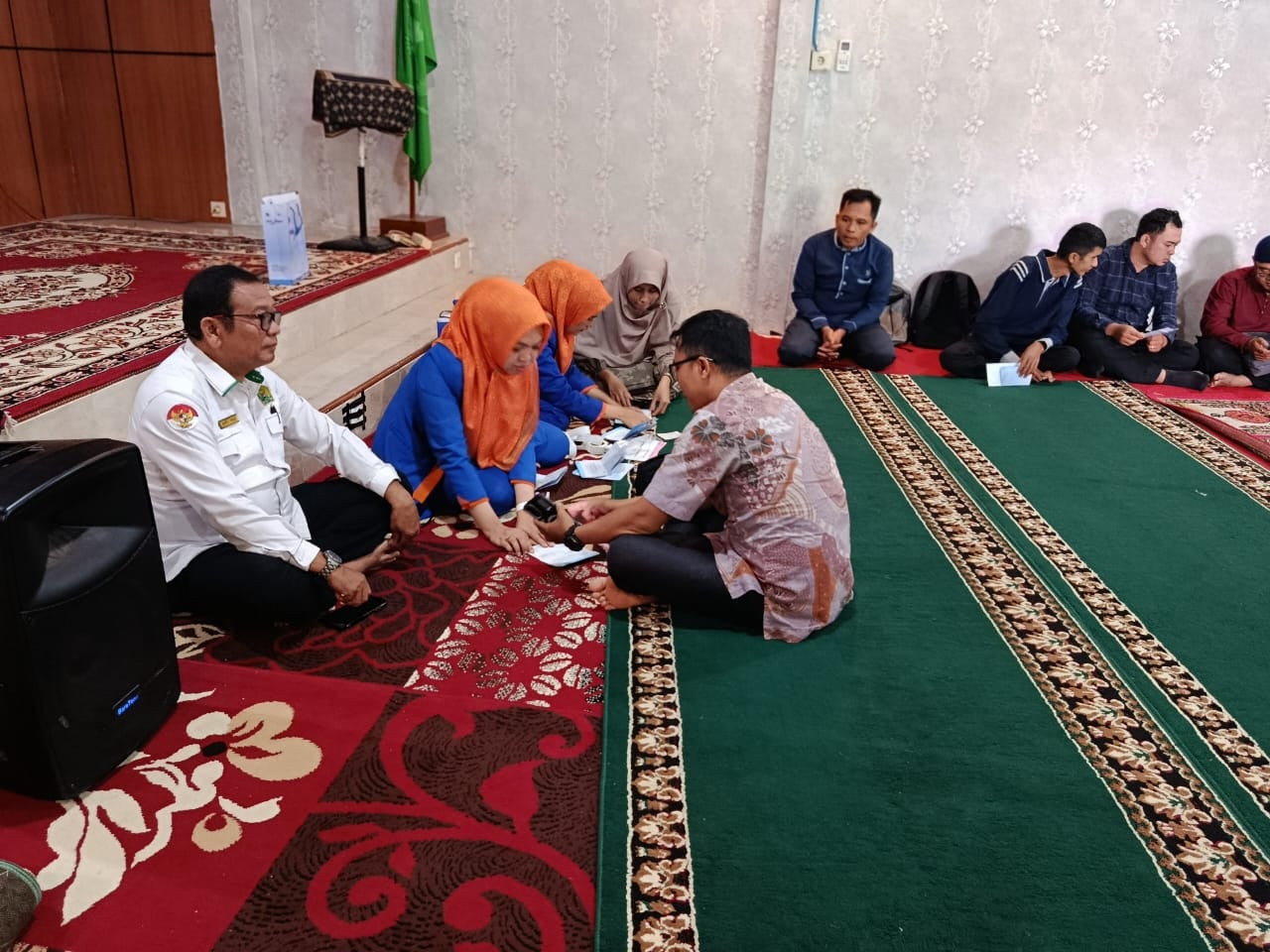 Pastikan Kesejahteraan Guru, Bank Nagari Syariah Salurkan Buku Tabungan TPG PAI Kota Solok